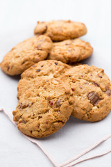 Chocolate oatmeal cookies on the  wooden background.