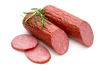 Salami smoked sausage, basil leaves on white background cutout.