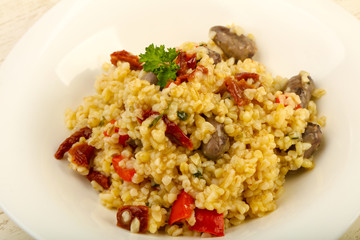 Bulgur with chicken hearts