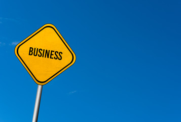 business - yellow sign with blue sky