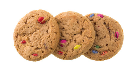 Top view of three candy cookies in a row isolated on a white background.