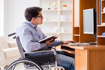 Disabled student studying at home on wheelchair