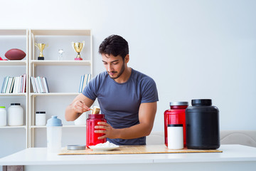 Athlete tasting new protein supplements for better muscles