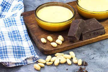 algerian sweet food caramel flan with peanuts and chocolate bars