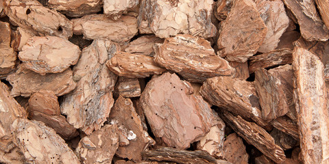 background of pieces of pine bark, used for design and drainage in parks and gardens