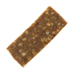 Top view of a cashew and date energy bar isolated on a white background.