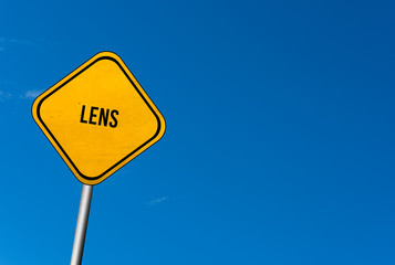 lens - yellow sign with blue sky