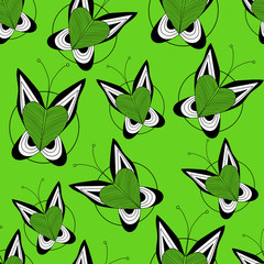 butterfly seamless pattern on a green background