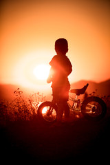 Fototapeta na wymiar Boy Biking 