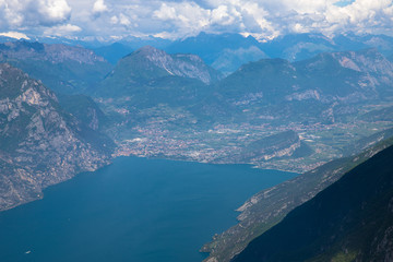 Fototapeta na wymiar Panorama of the gorgeous Lake Garda surrounded by mountains in Monte Baldo Macesine, Provincia di Verona, Veneto, Italy