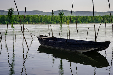 Naklejka na ściany i meble fishing boats on Danube river near Novi Sad, Serbia