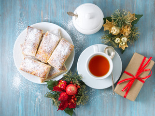 Delicious rolls from lush yeast-free puff pastry. Breakfast with cup of tea and homemade cakes in morning at christmas
