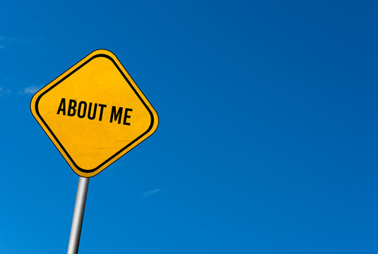 about me - yellow sign with blue sky