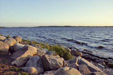 Fototapeta na wymiar big stones on the coast by jziprian