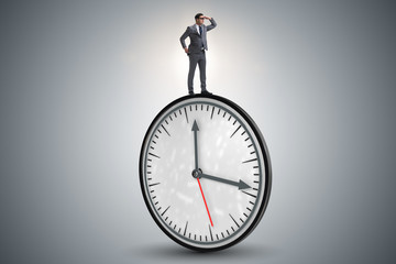 Businessman in time management concept
