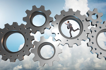 Teamwork concept with cogwheels and business people