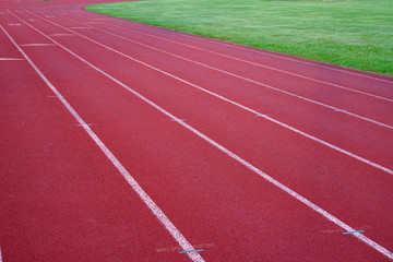 red outdoor running track in sport field