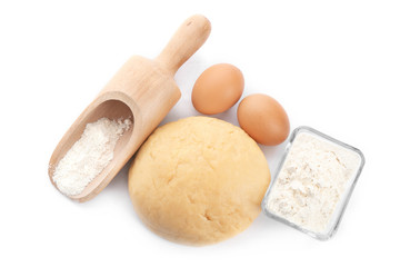 Fototapeta na wymiar Composition with fresh raw dough on white background, top view