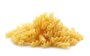 Uncooked fusilli pasta on white background