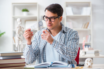 Medical student sitting at the lecture in university