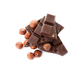 Delicious black chocolate with nuts on white background