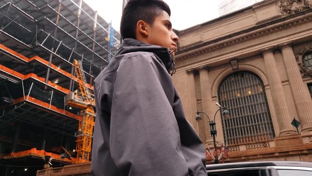 Teenager Male standing up at sidewalk in New York City 4K