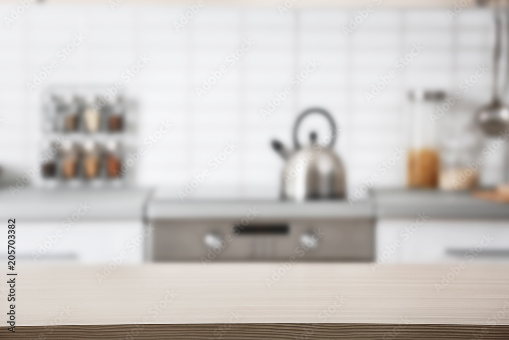 Wall mural Countertop and blurred view of kitchen interior. Idea for home design