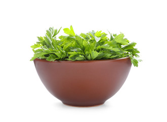 Fototapeta premium Bowl with fresh green parsley on white background