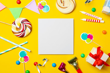 Flat lay composition with birthday party items on color background
