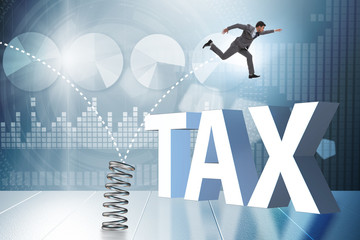 Businessman jumping from spring in business concept