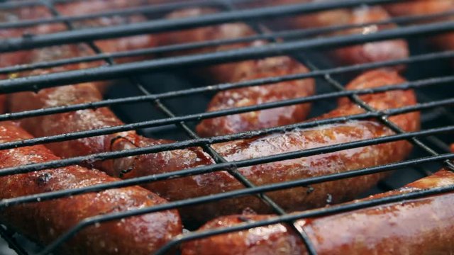 Grilled sausages on bbq. Variety Original Nuremberg Rostbratwurst . Pork ground meat, dill, nutmeg, garlic, cardamom, marjoram in the natural gut. There are also other types: rostbratwurst, currywurst