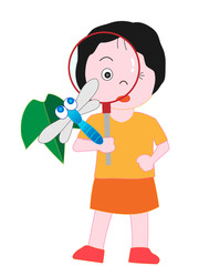 虫眼鏡でトンボを観察している子供