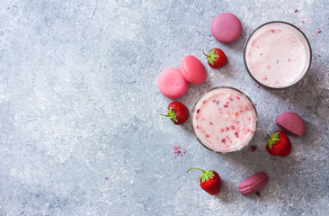Milk and strawberries cool drink, fresh strawberries and macaroons