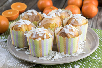 Tangerine muffins with coconut slices
