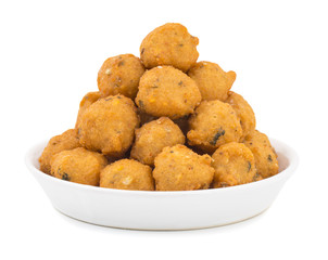Indian Spicy Street Food Dal Vada Also Know as Moong Dal Vada, Pakoda, Pakode, Pakore, Moong Vada, Pakora or Bhajiya isolated on White Background