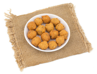 Indian Spicy Street Food Dal Vada Also Know as Moong Dal Vada, Pakoda, Pakode, Pakore, Moong Vada, Pakora or Bhajiya isolated on White Background