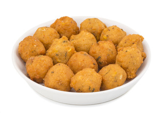 Indian Spicy Street Food Dal Vada Also Know as Moong Dal Vada, Pakoda, Pakode, Pakore, Moong Vada, Pakora or Bhajiya isolated on White Background