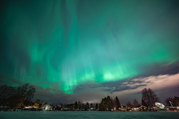 north light aurora on night sky at swedish countryside, north of country, village
