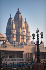 Streetlight with the image of a Hindu hexagram and syllable of 