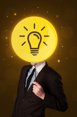 Smart businessman holding round sign with yellow lightbulb 