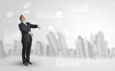 Young elegant businessman with city and report dream concept