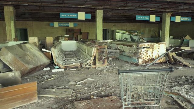 Abandoned supermarket in Pripyat. Chernobyl nuclear disaster, catastrophe. Slider shot - Juni 2017: 30km Chernobyl, exclusion zone