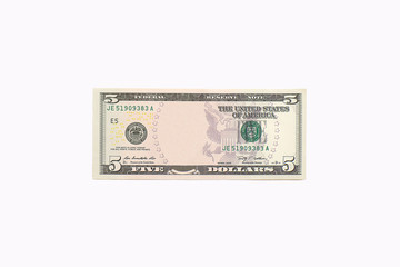 Five dollar bill with Abraham Lincoln portrait removed.