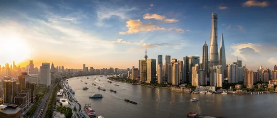 Fotobehang Shanghai Panorama van een zonsondergang achter de moderne skyline van Shanghai, China