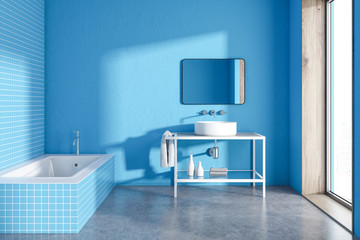 Fototapeta na wymiar Blue tiled bathroom interior