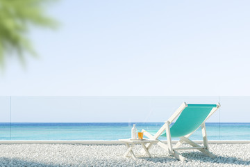 Blue deck chair on the beach