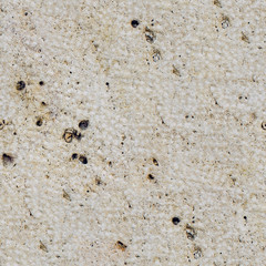 Old rock surface seamless texture or background.
