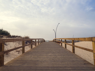 wooden footbridge on the beach