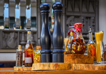 Spices and  herbs ingredients in decorative glass bottles,kitchen decoration