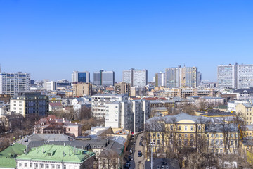 view of Moscow cityscape, old historical town and urban skyscrapers (Moscow International Business Center background) with sunny blue sky, Moscow city, Russia